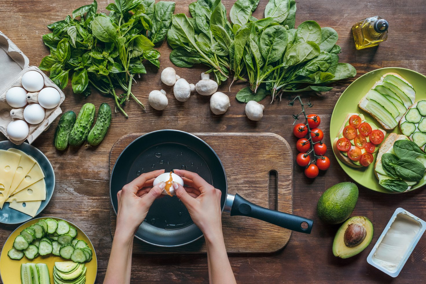 woman cooking egg